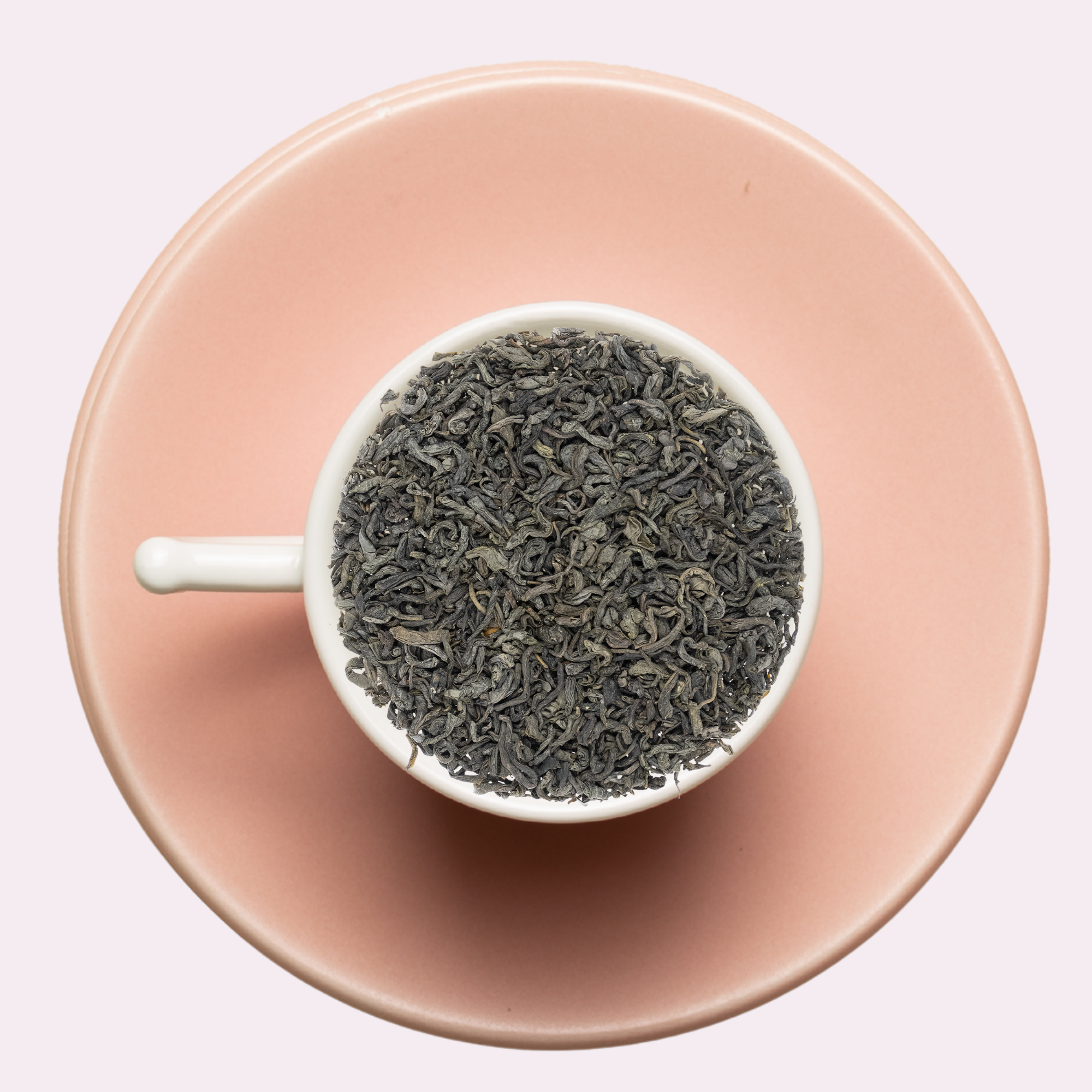 Chunmee tea close-up – curled “precious eyebrow” leaves in focus

Atelier So Lovely